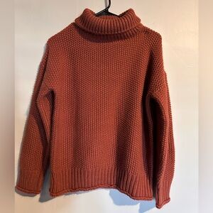 Women’s small turtleneck rust sweater